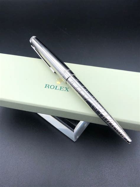 rolex platinum pen|Rolex wave pen.